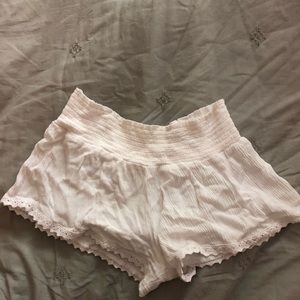 White mini Flowy shorts from Pacsun